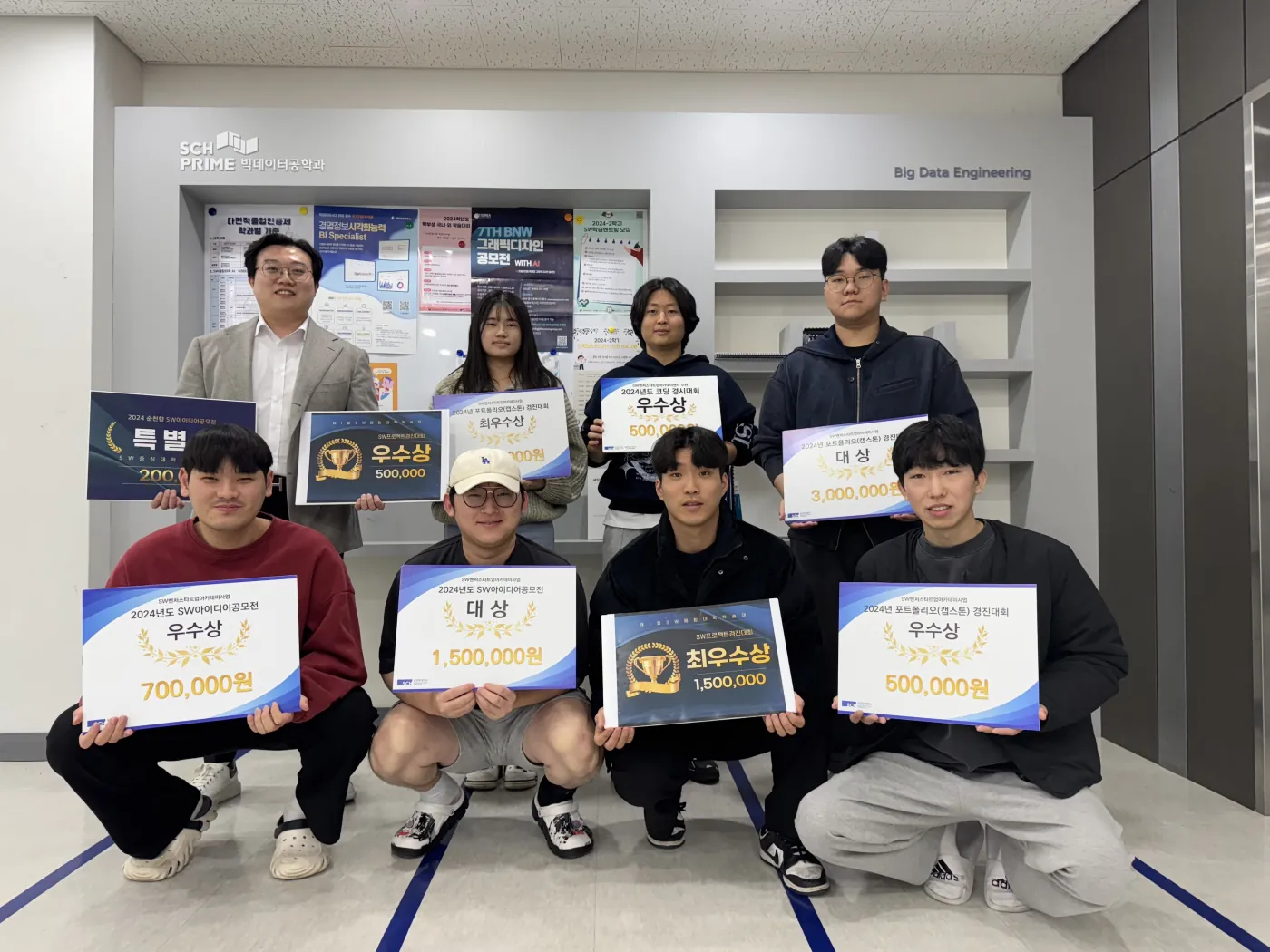 SAIL members holding award certificates